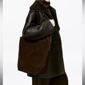 SOLD! Brand new chocolate suede bag